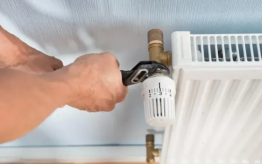 Réglage d'un robinet thermostatique de radiateur après désembouage du circuit